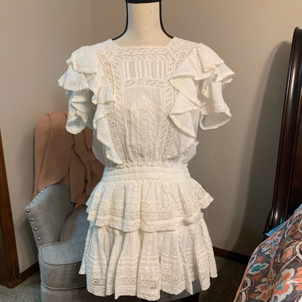 Brand new ruffled mini dress never worn.